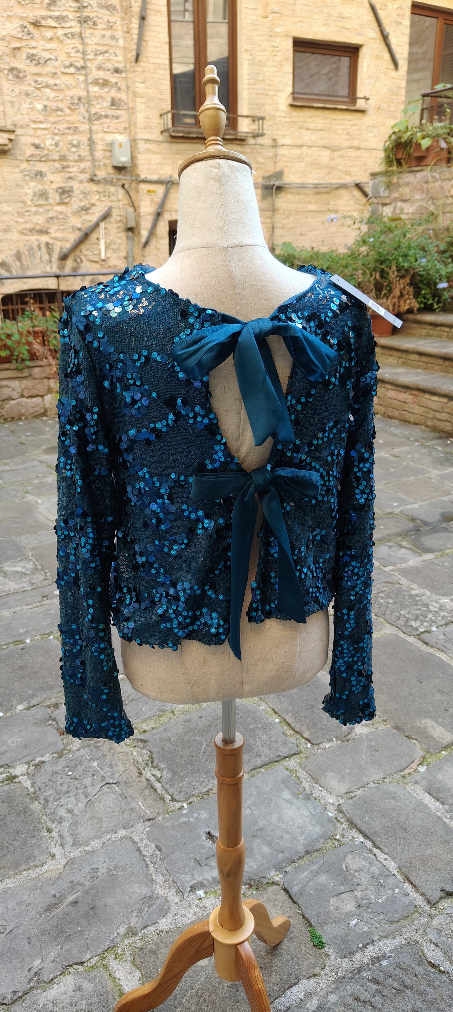 Maglia fiocchi turchese