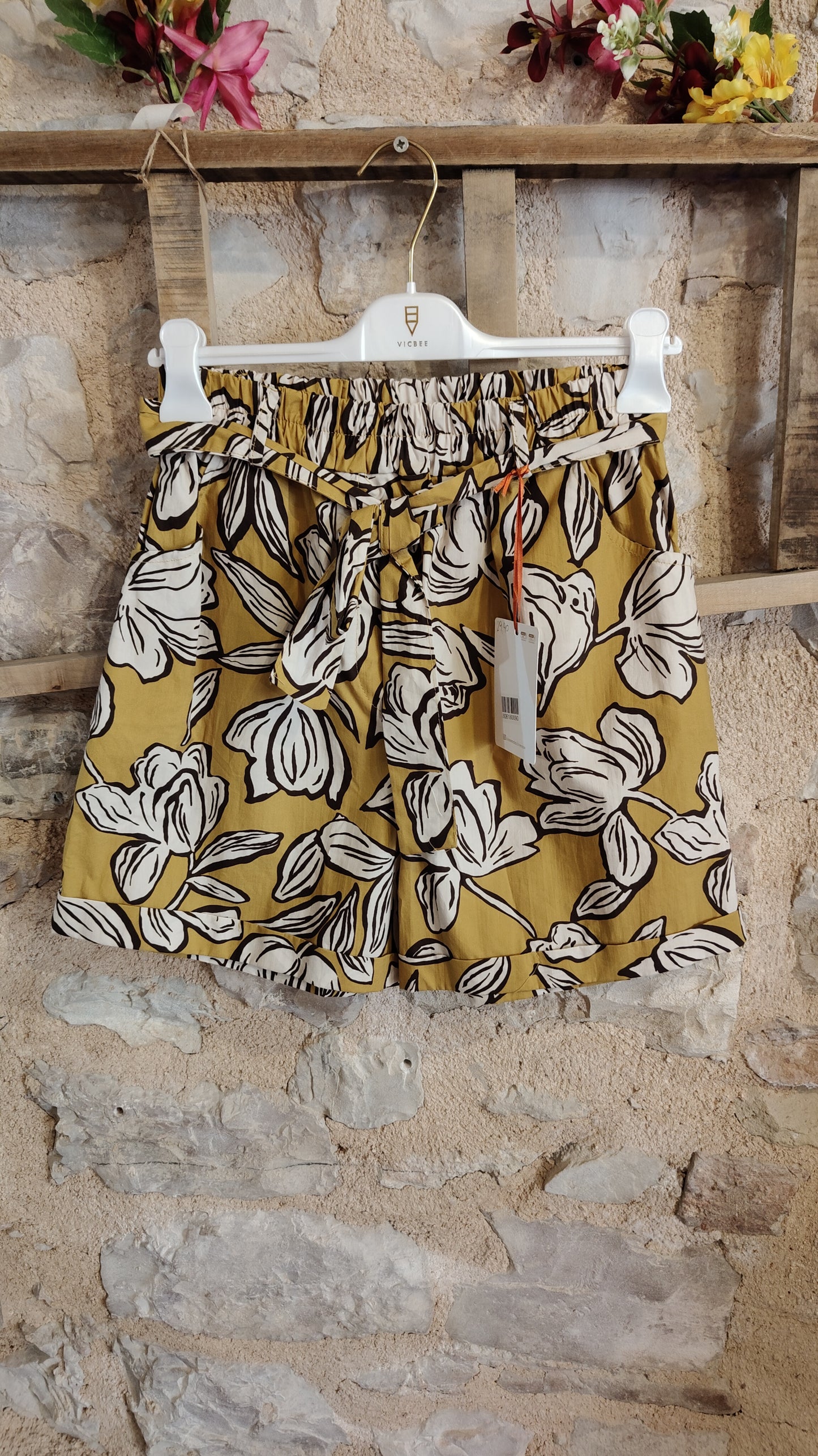 Shorts fiori senape