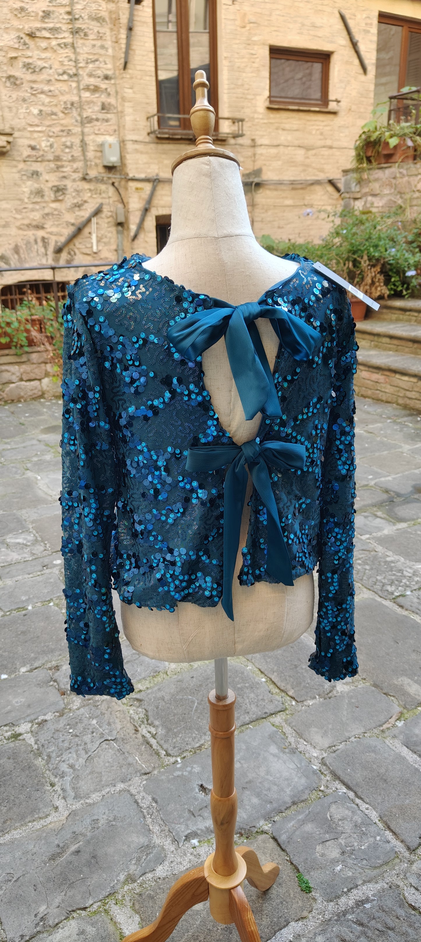 Maglia fiocchi turchese