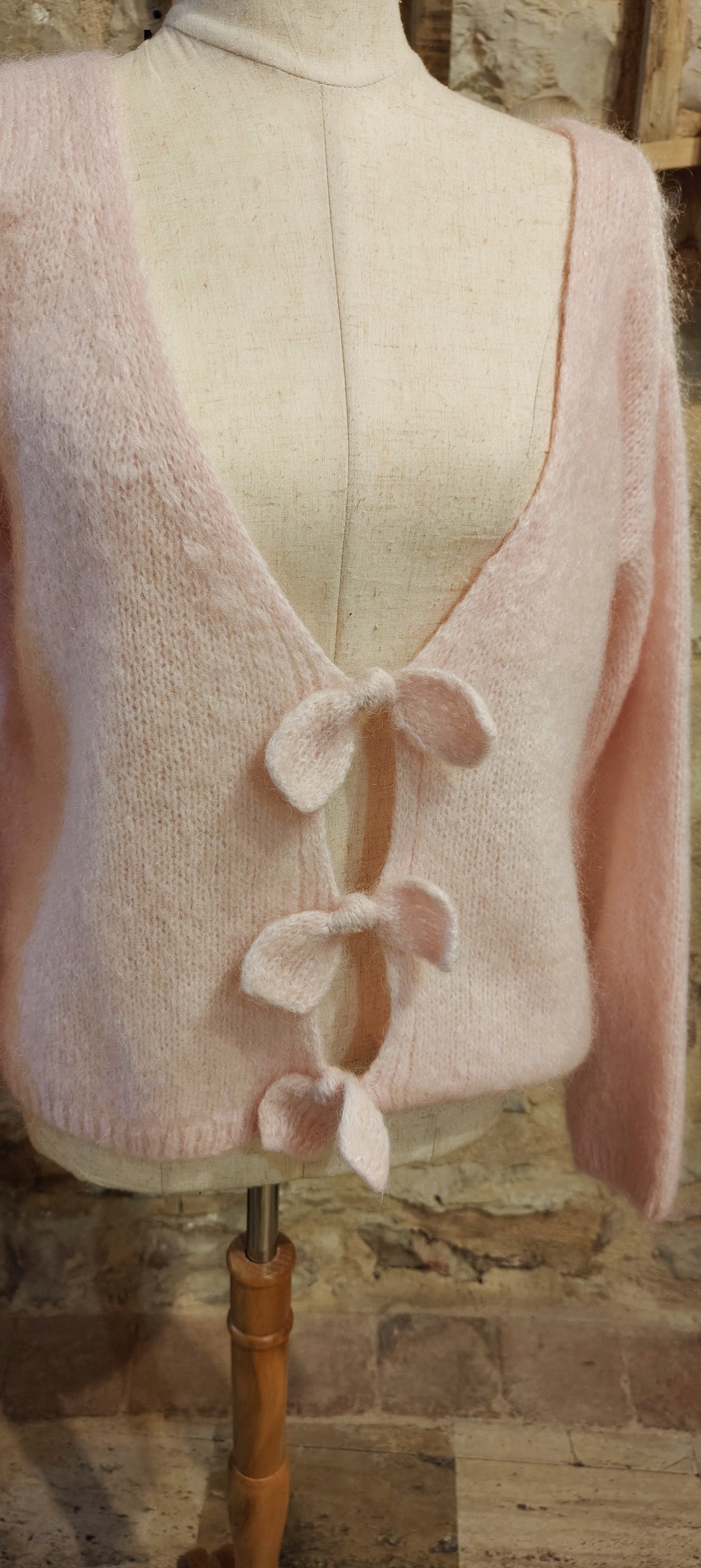 Maglione fiocchetti rosa