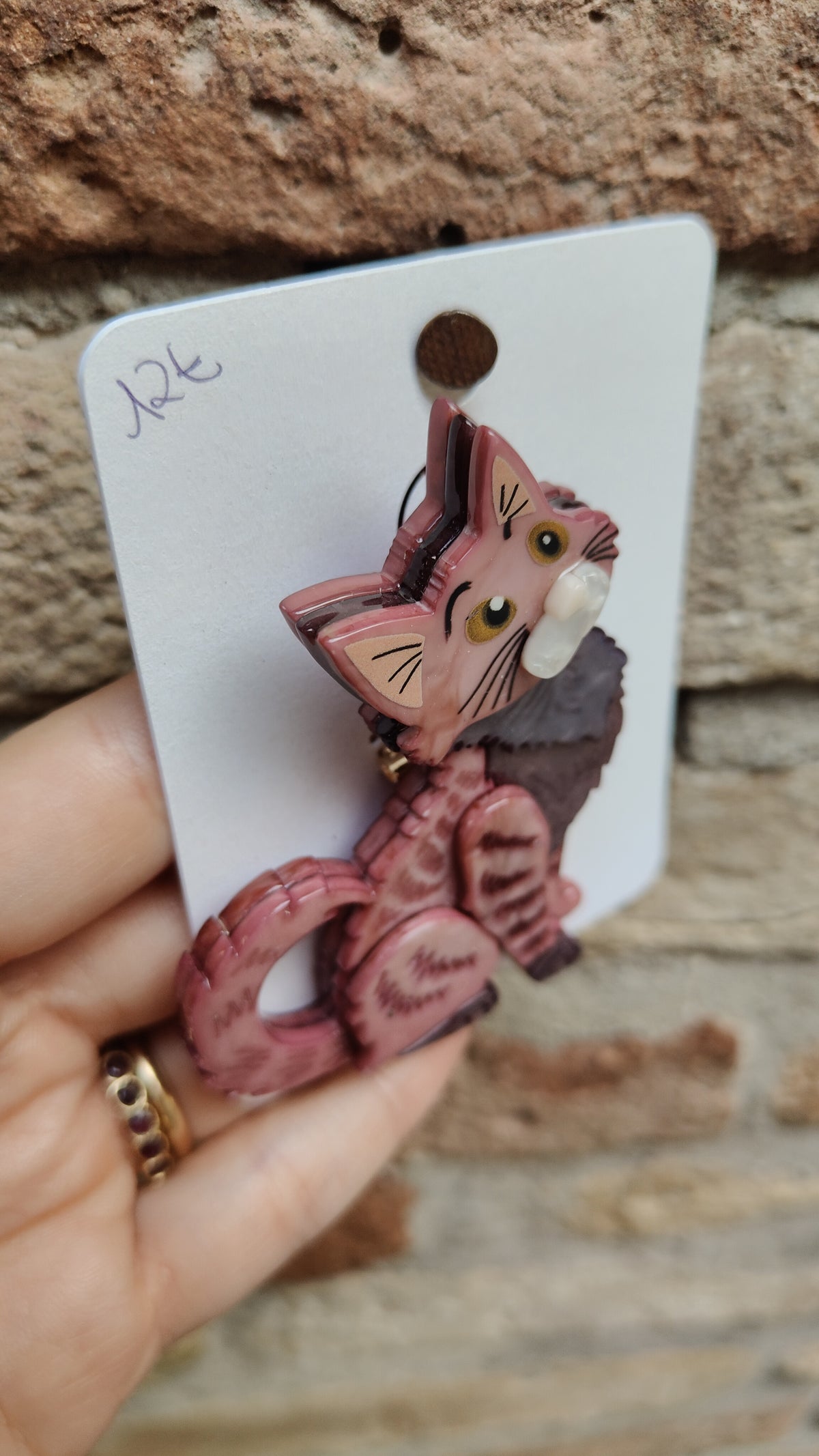Spilla cat 2
