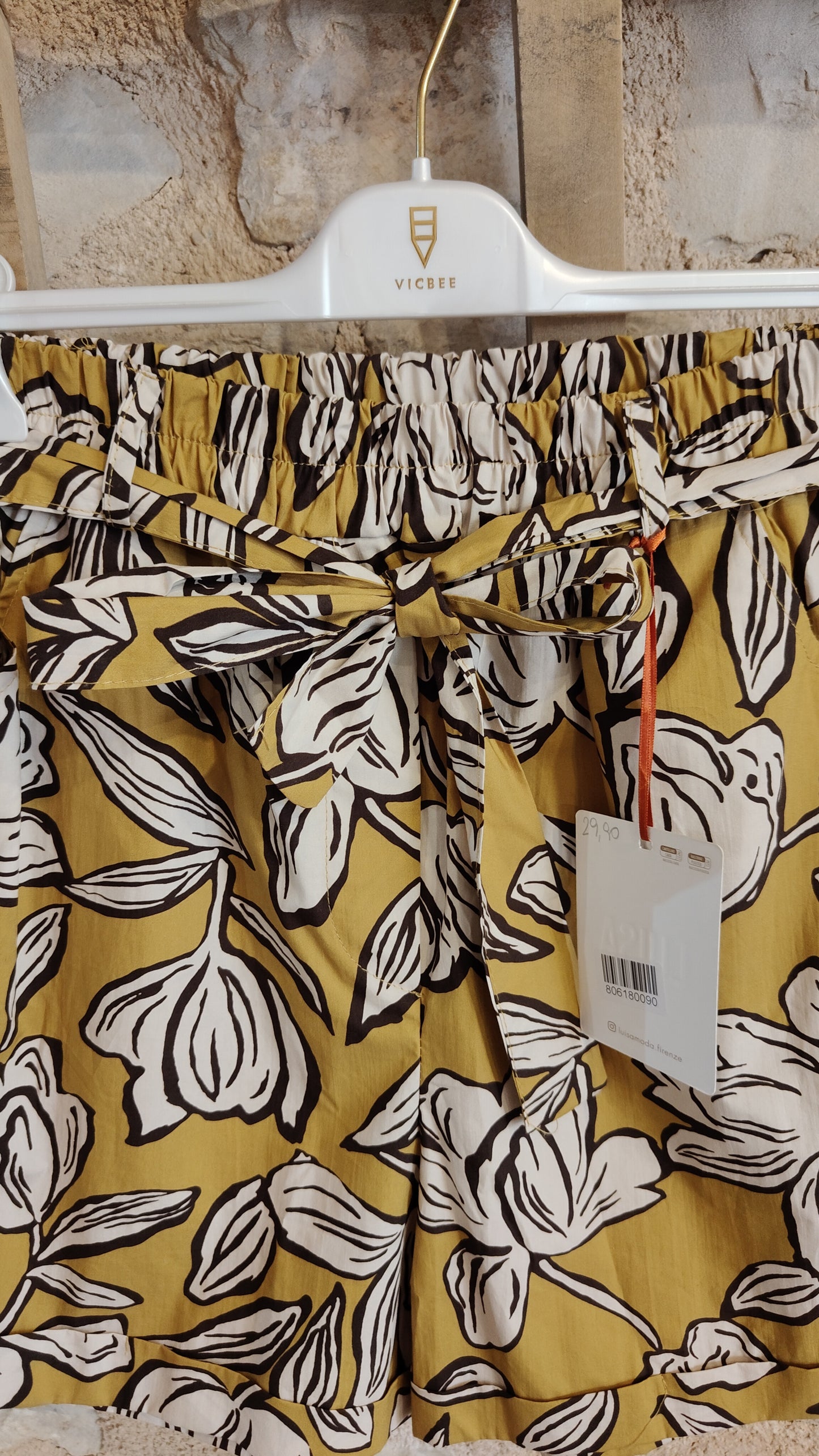 Shorts fiori senape