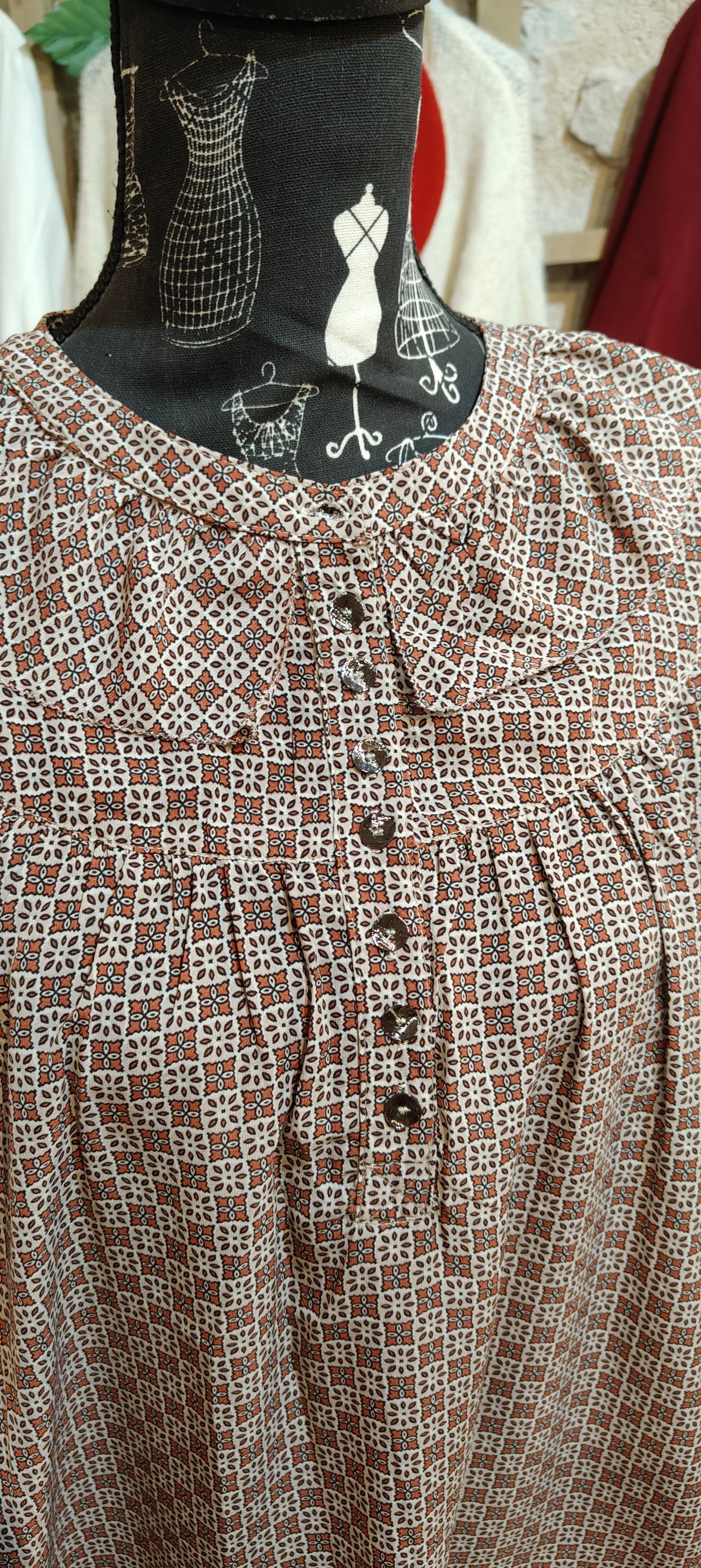 Blusa geometrica rossa