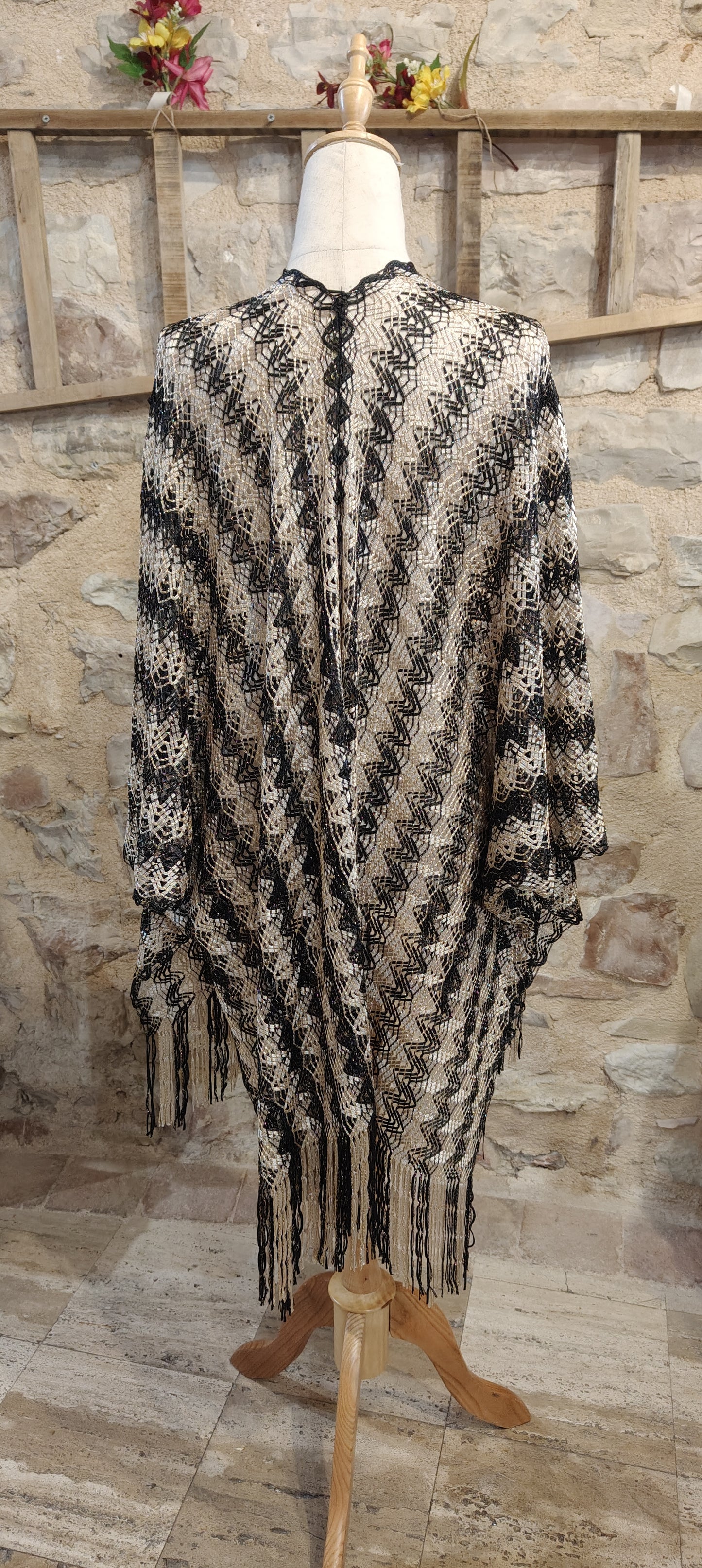 Poncho laccetti
