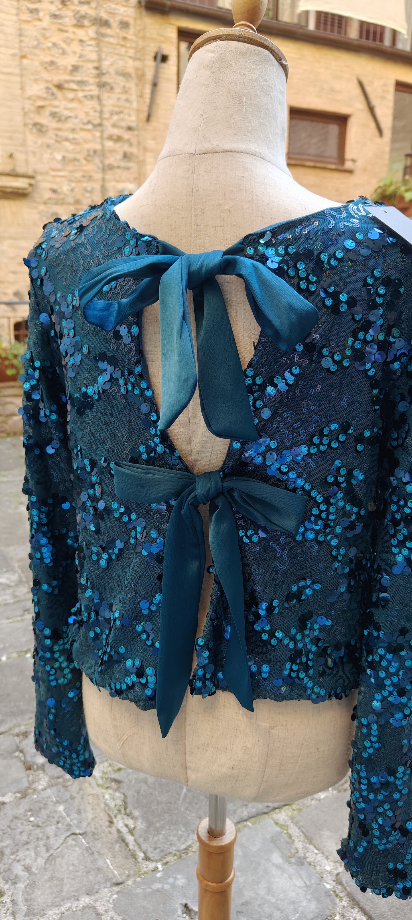 Maglia fiocchi turchese